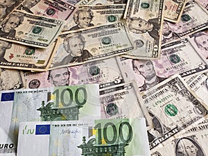 European banknotes and American dollars bills of different denominations