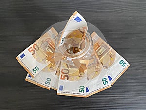 European banknotes saved in a jar