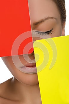 European beautiful woman with red and yellow card