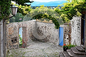 European castle courtyard with blue door