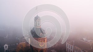 Europian city center covered in fog or mist with doves photo