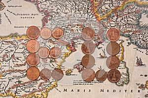 European coins on old map
