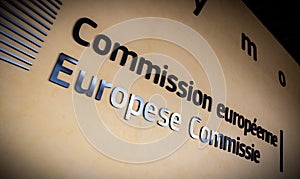 European Commission sign at the entrance of the Berlaymont building in Brussels.  Belgium - July 30, 2014 photo