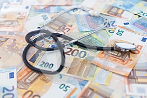 European currency sick concept: stethoscope on euro banknotes