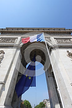 European flag flying under the Arc de Triomphe in Paris