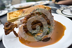 European Food: Roasted lamb shank in gravy sauce