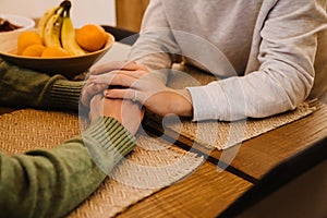 European gay couple holding hands while spending time together