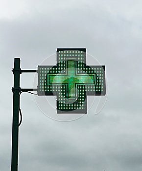 European green cross pharmacy store sign: Farmacia. Pharmacy sign. photo