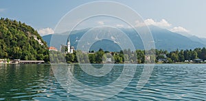 European lake panoram with old church