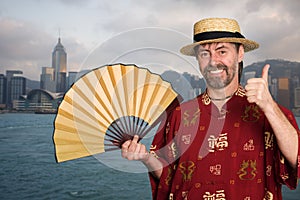 European man in traditional Chinese costume in Hong Kong