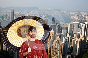 European man in traditional Chinese suit in Hong Kong