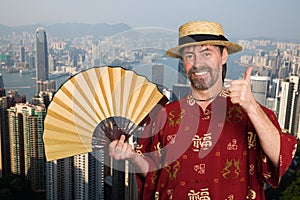 European man in traditional Chinese suit in Hong Kong