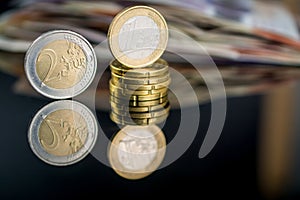 European money coins on black background