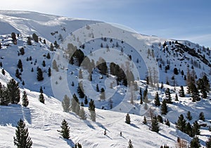 European mountains landscape, Alps, Italy, mountain skiing resort, picturesque view with deep blue sky, high rock peaks on horizon