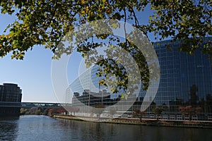 European Parliament in Strasburg on a sunny day, reflection in the river