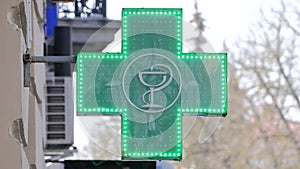 EUROPEAN PHARMACY SIGN: The green cross, often animated, is a symbol found in many countries in Europe