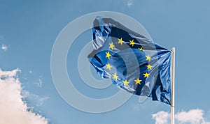 European Union EU flag against a blue sky. Soon there will be one less star since the UK voted to leave the EU in 2016,