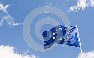 European Union EU flag against a blue sky. Soon there will be one less star since the UK voted to leave the EU in 2016,