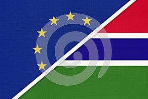 European Union or EU and The Gambia national flag from textile. Symbol of the Council of Europe association