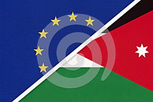 European Union or EU and Jordan national flag from textile. Symbol of the Council of Europe association