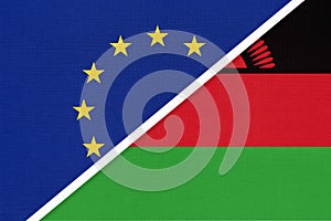 European Union or EU and Malawi national flag from textile. Symbol of the Council of Europe association