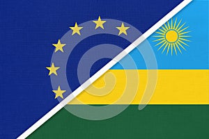 European Union or EU and Rwanda national flag from textile. Symbol of the Council of Europe association photo