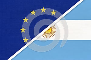 European Union or EU vs Argentina national flag from textile. Symbol of the Council of Europe association