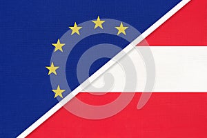 European Union or EU vs Austria national flag from textile. Symbol of the Council of Europe association