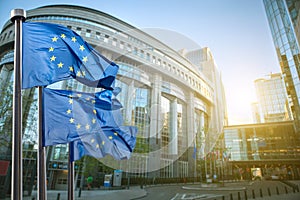 European union flag against parliament in Brussels