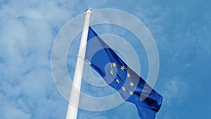 European union flag. Blue sky on the background