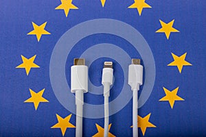 EUROPEAN UNION flag and USBC universal charging cable as a standard for small electronic devices