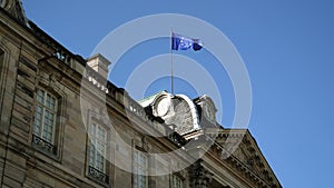 European union flag waving on top of Rohan Palace