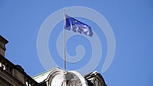 European union flag waving on top of Rohan Palace