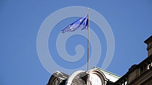 European union flag waving on top of Rohan Palace