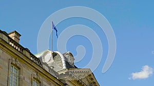 European union flag waving on top of Rohan Palace