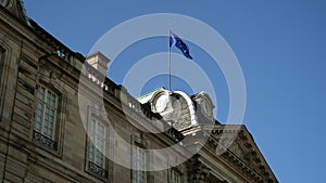 European union flag waving on top of Rohan Palace slow motion