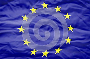 European Union flag on a wavy background.