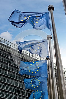 European Union flags in front of the Berlaymont building (European commission) in Brussels, Belgium.