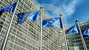 European Union flags waving in the wind in front of European Commission. Brussels, Belgium. 4K