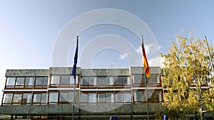 European union and Germany flag waving in front of Constitutional Court