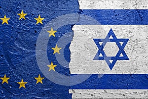 European Union and Israel flag on broken concrete wall background