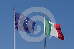 European Union and Italian flags waving