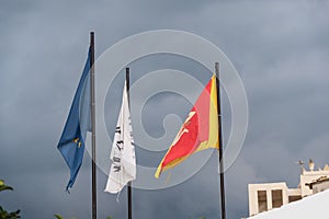 European Union and Sicilian Flags Waving in the Sky of Donnalucata, Scicli, Ragusa, Sicily, Italy