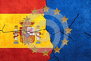 European union and Spanish flags breaking apart