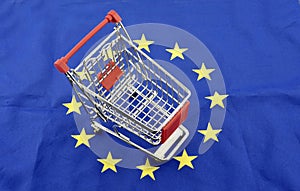 European Union trade market surplus deficit shopping cart isolated september 18, 2016