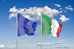 European Union vs Italy. Thick colored silky flags of European Union and Italy. 3D illustration on sky background. - Illustration