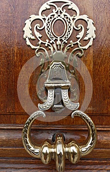 European Vintage old metal wrought iron door knocker. Design detail. Paris