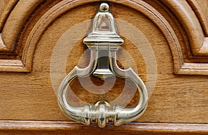 European Vintage old metal wrought iron door knocker. Design detail. Paris