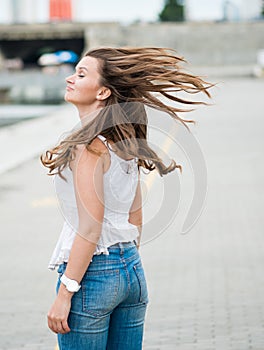 European woman with hair flying