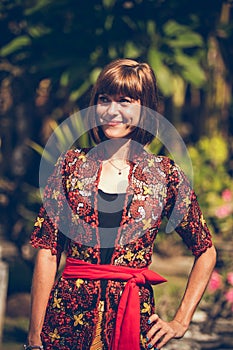 European woman in traditional balinese wedding ceremony costume.